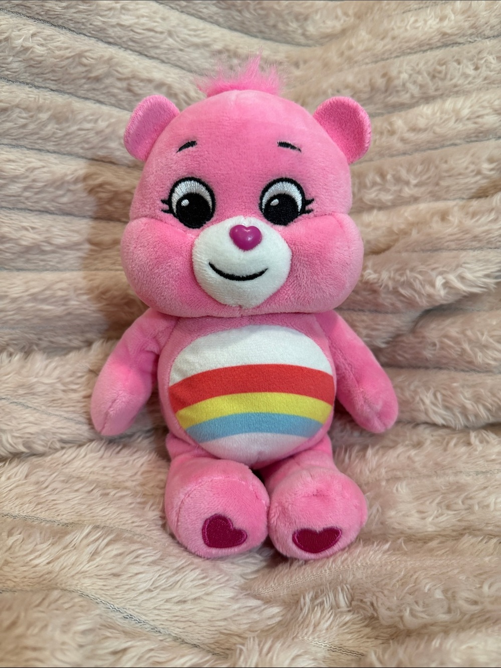 Rainbow Care Bear plush